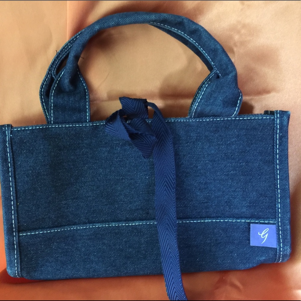 Blue Jean purse by g, NWT, lightweight Measures @ 10 1/2” x 3” x 5” high.